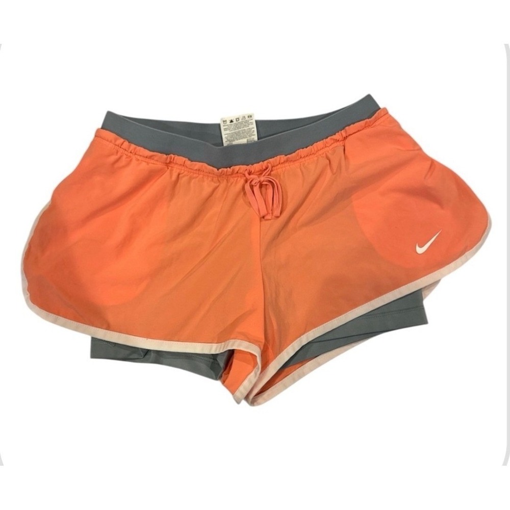 Nike Women's Athletic Shorts in peach/white and Grey